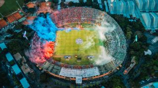 Stadium with Blue and Red Smoke
