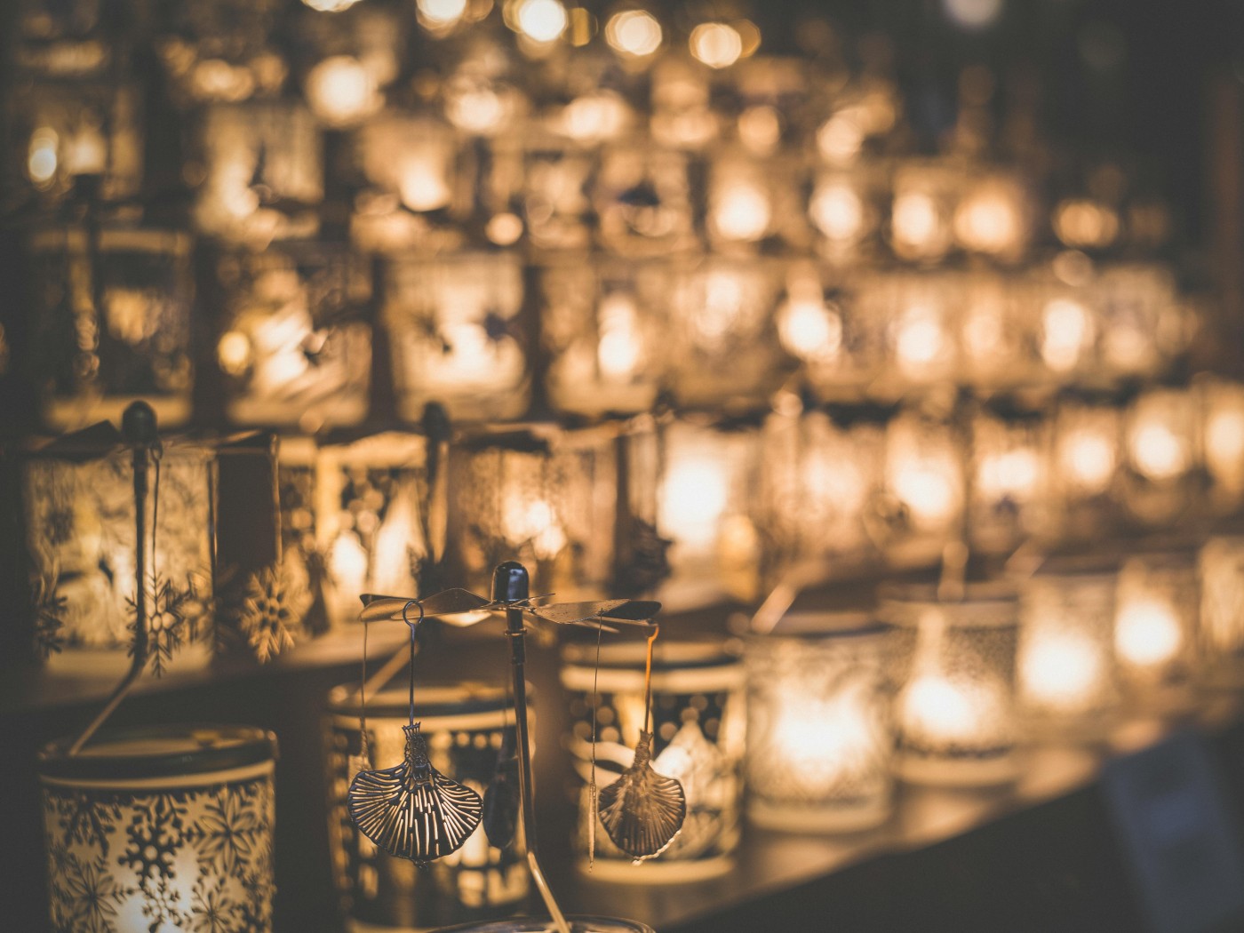 Clear Glass Candle Holder on Brown Wooden Table