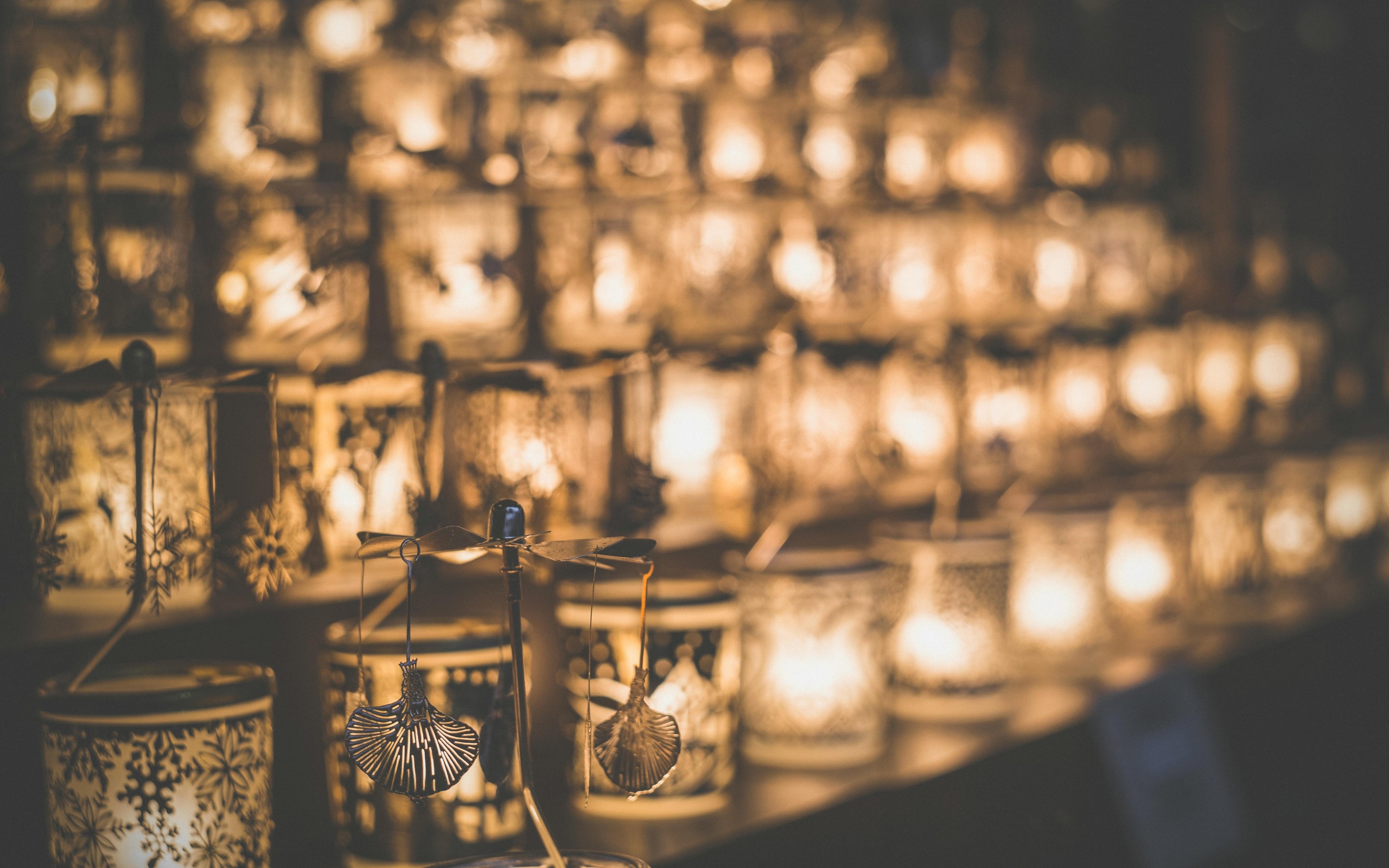 Clear Glass Candle Holder on Brown Wooden Table
