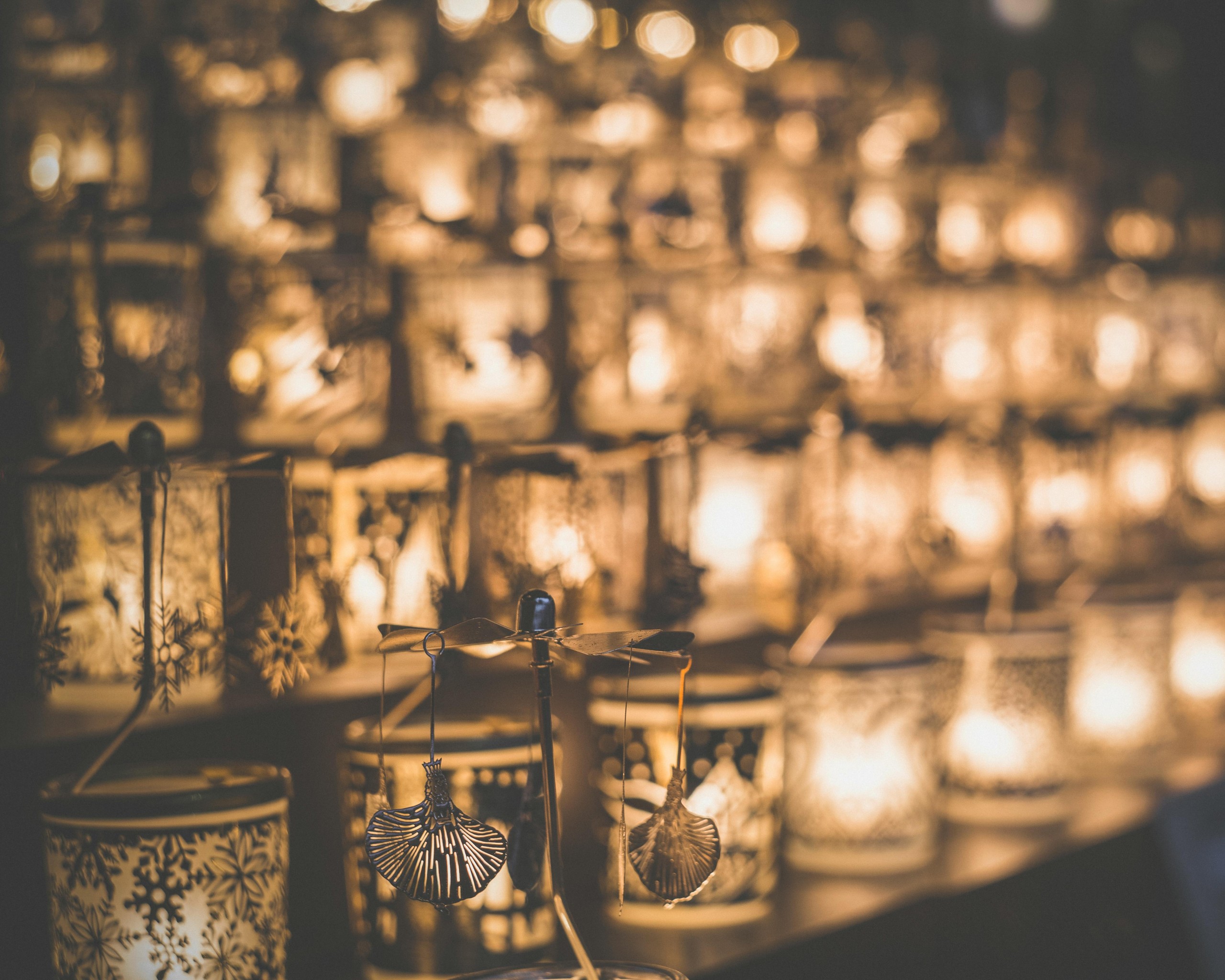 Clear Glass Candle Holder on Brown Wooden Table