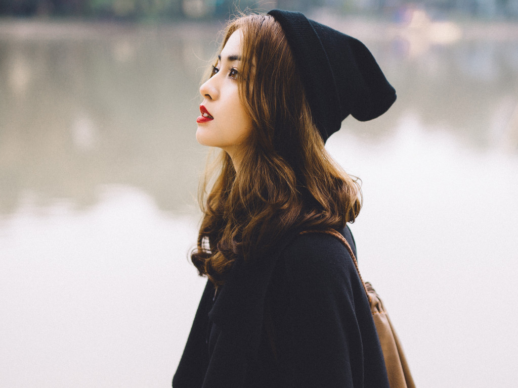 Woman In A Black Hat