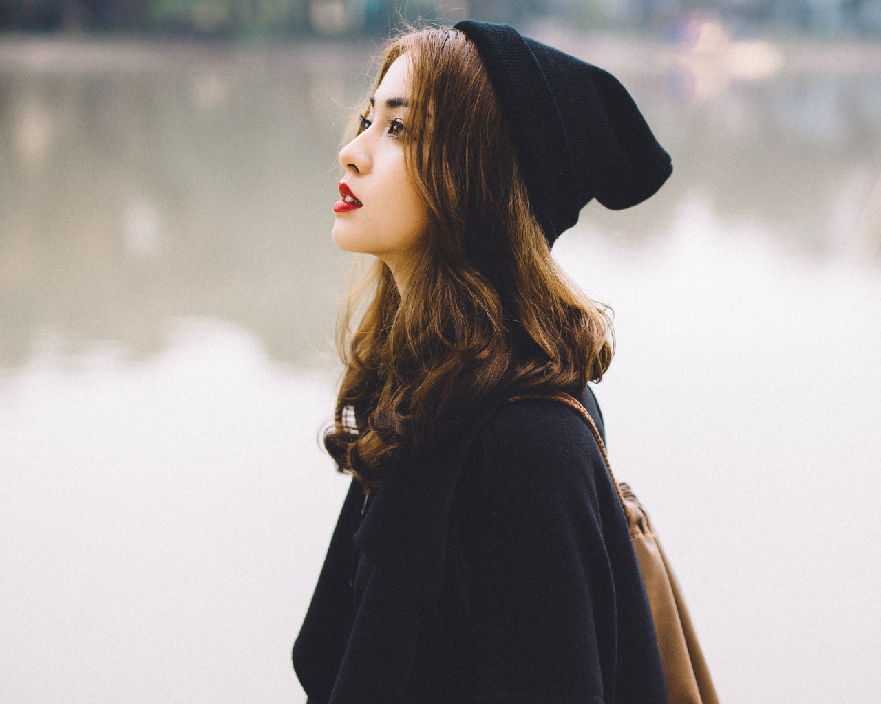 Woman In A Black Hat