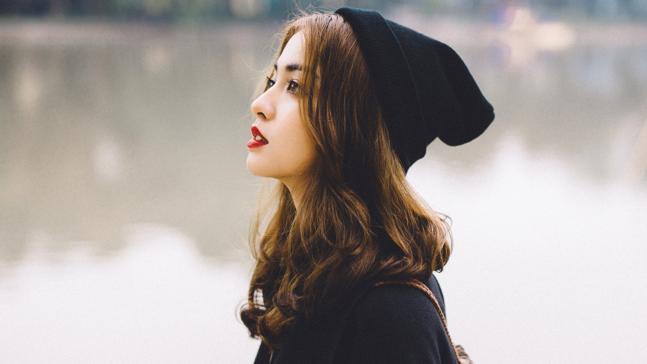 Woman In A Black Hat