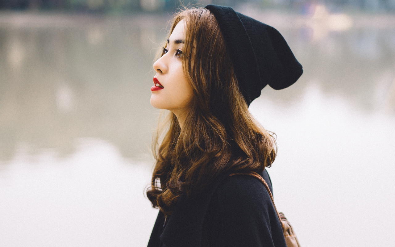 Woman In A Black Hat