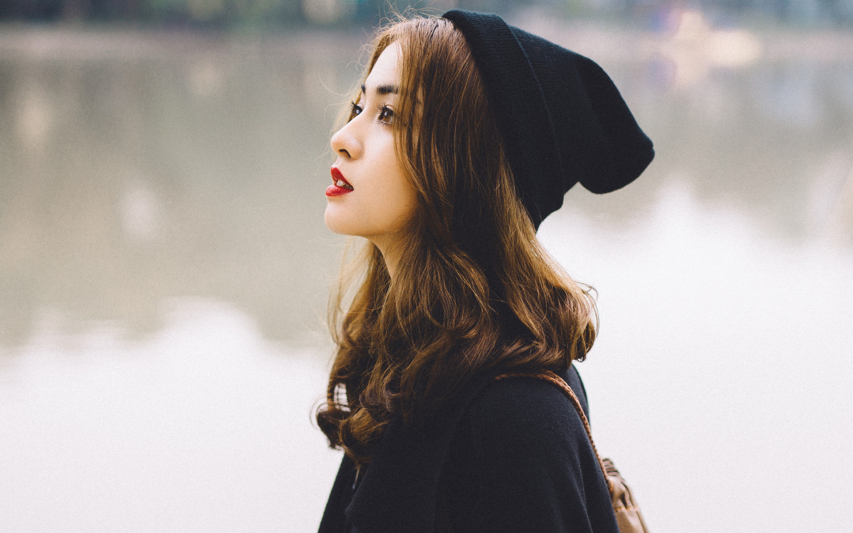 Woman In A Black Hat