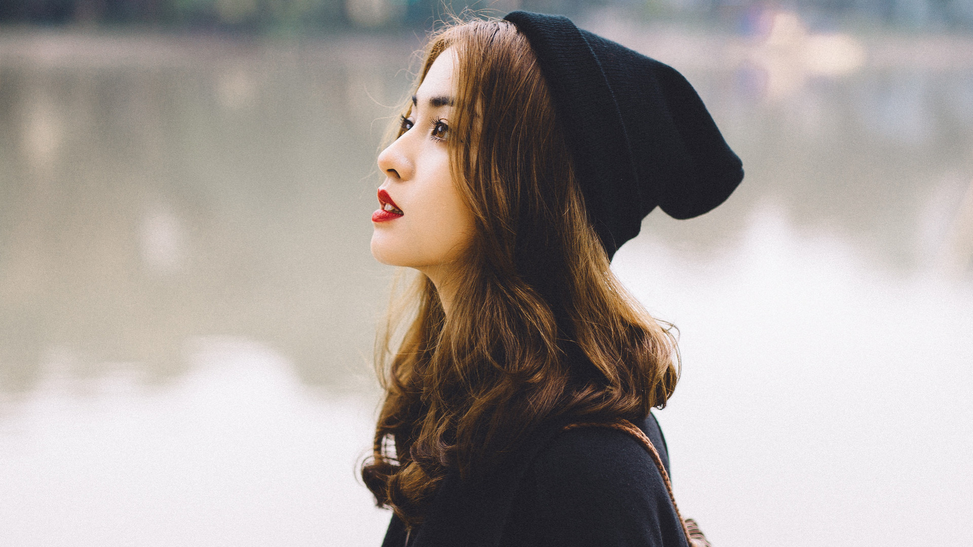 Woman In A Black Hat