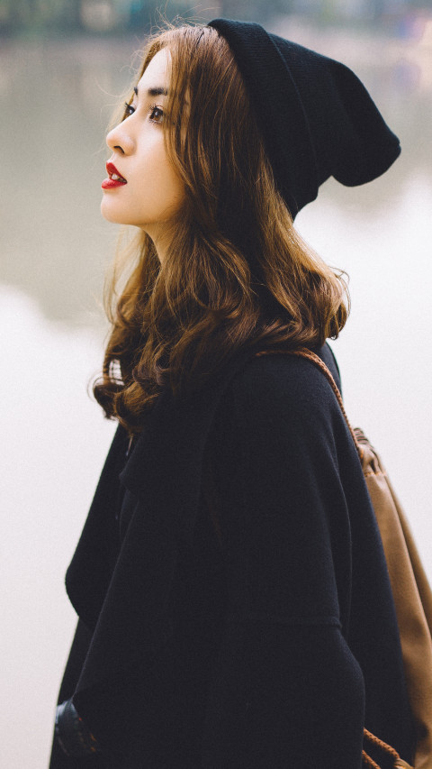 Woman In A Black Hat