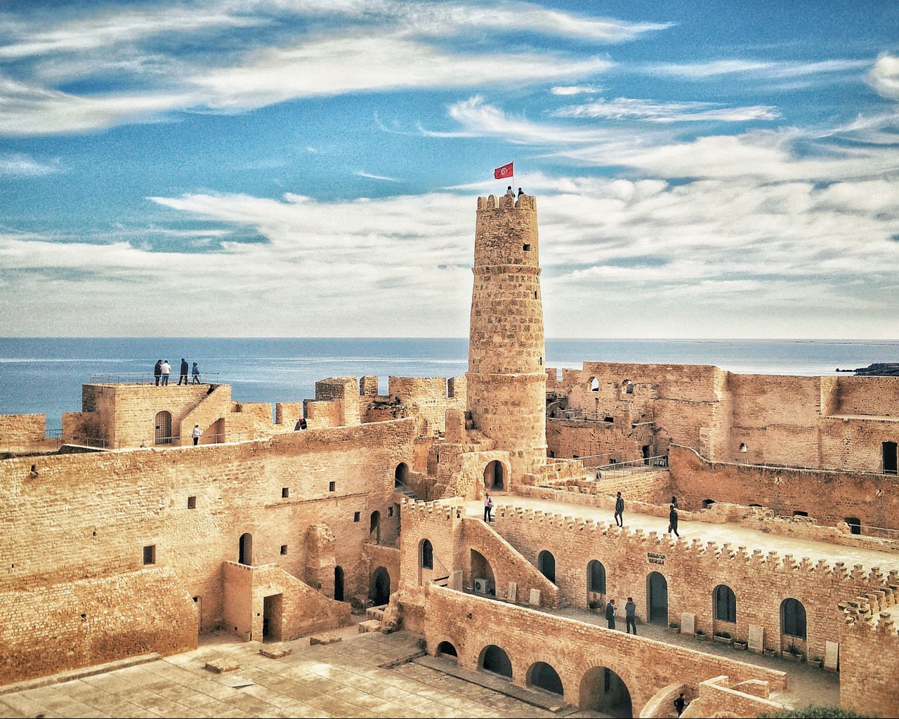 People Walking Near Tower
