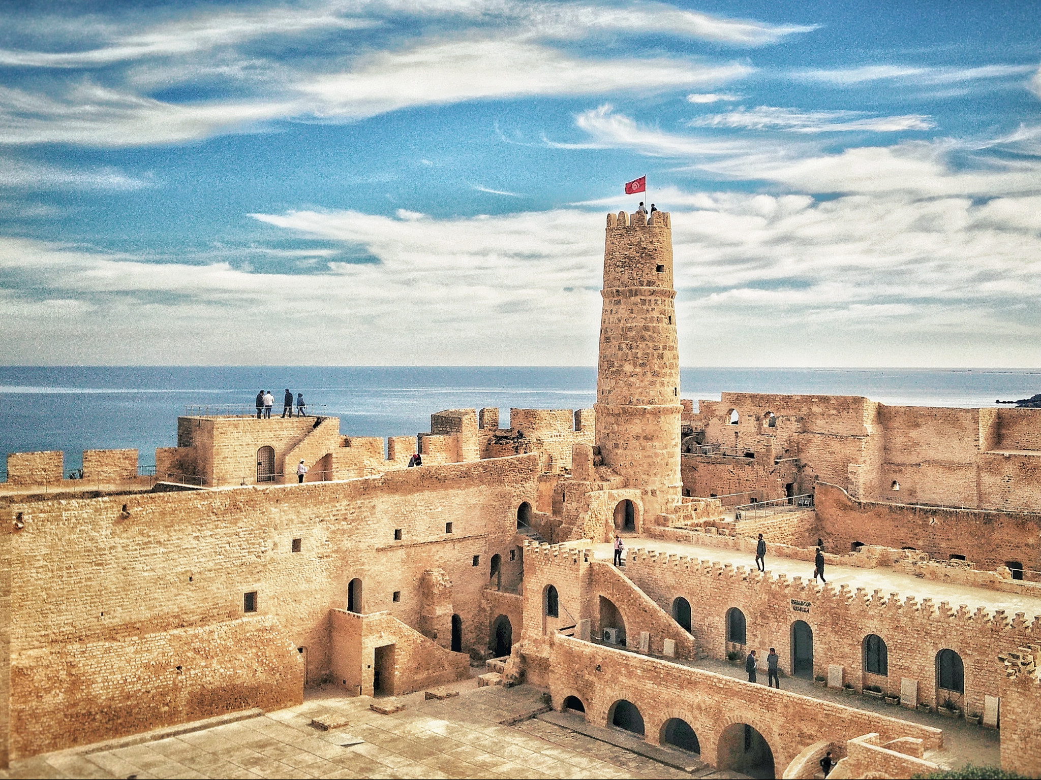 People Walking Near Tower