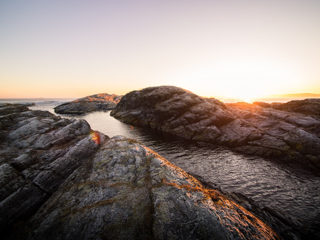Rock Formation Near Body of Water