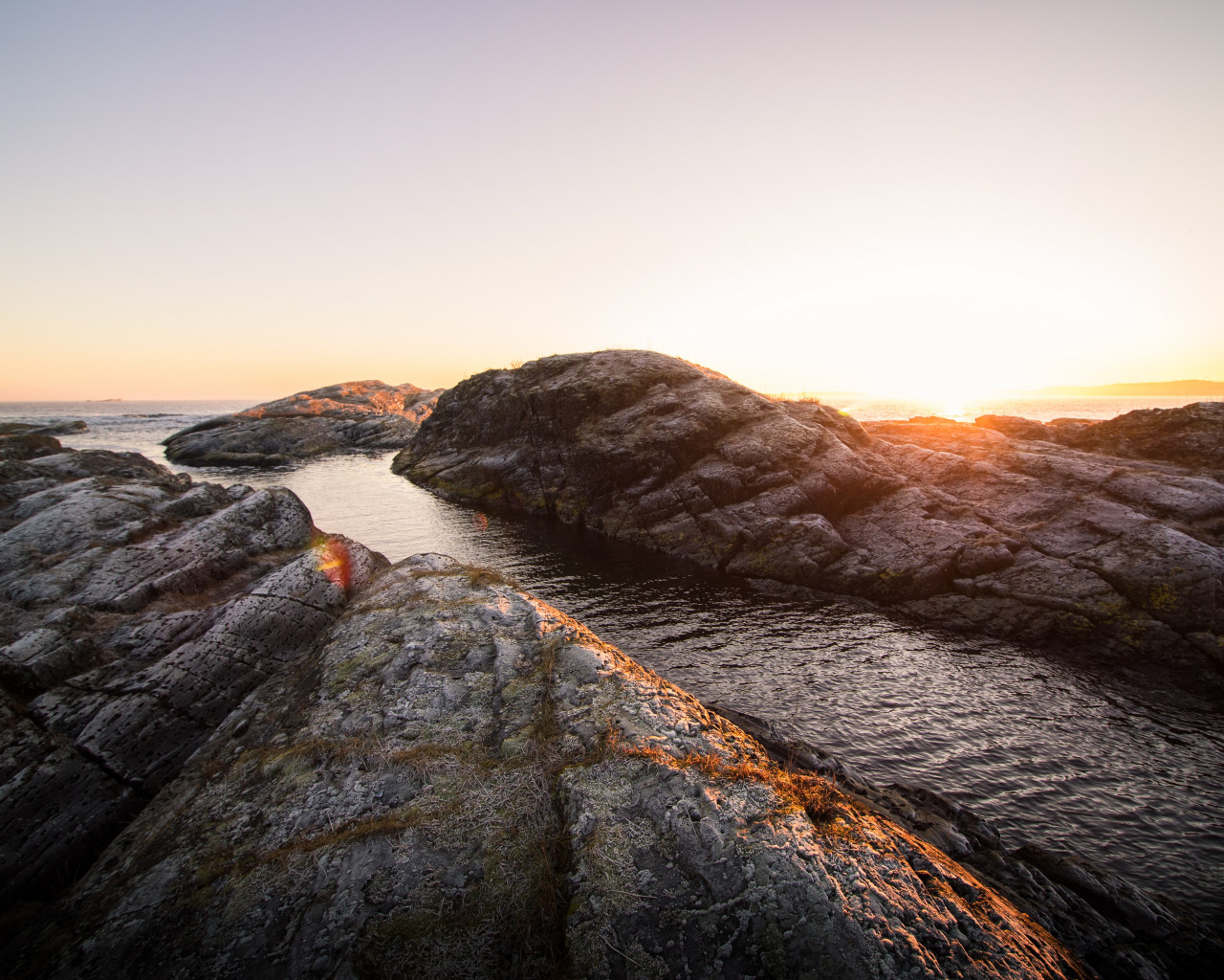 Rock Formation Near Body of Water