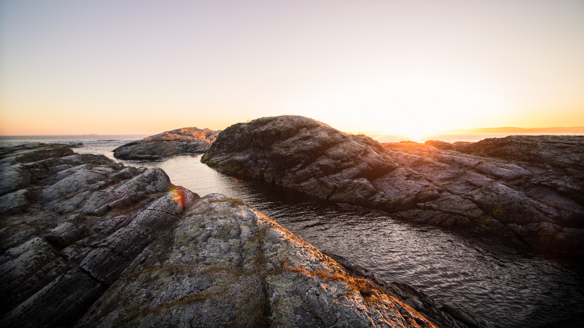Rock Formation Near Body of Water