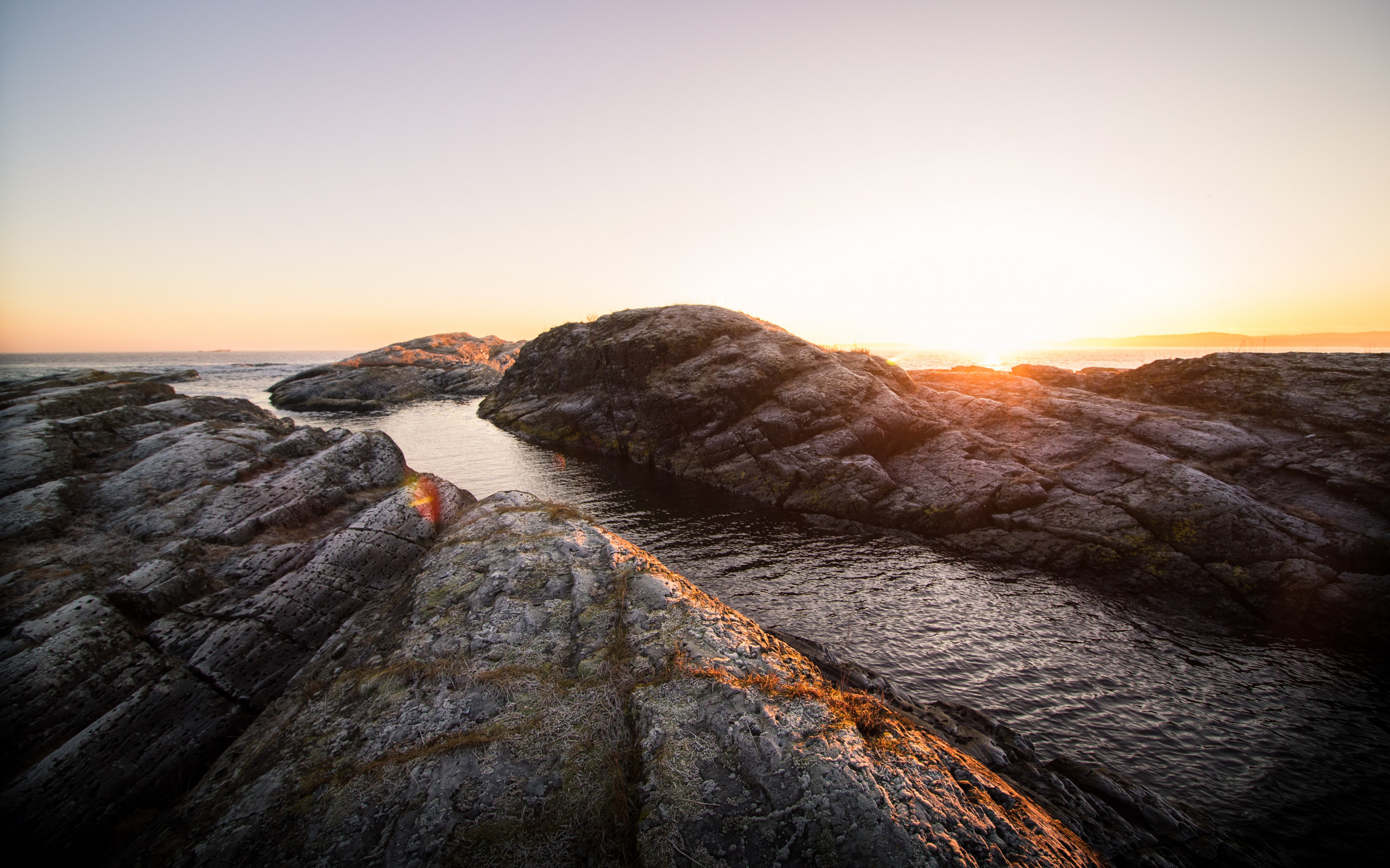 Rock Formation Near Body of Water