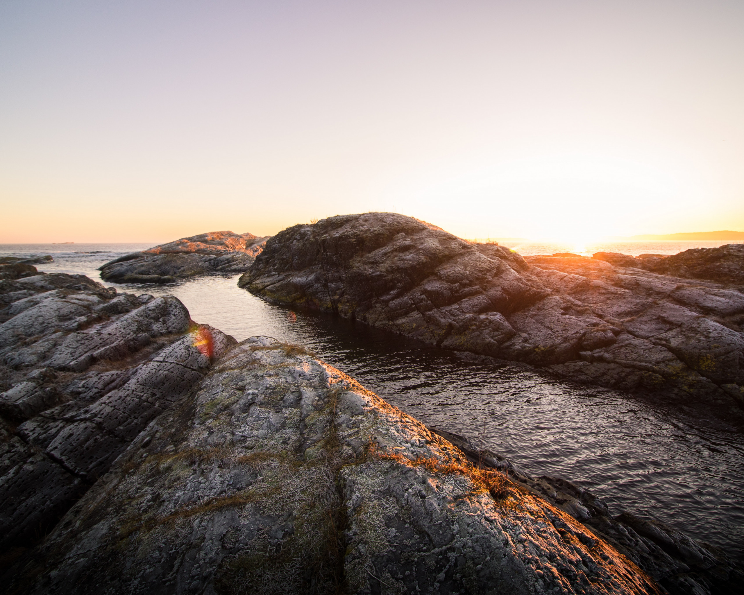 Rock Formation Near Body of Water