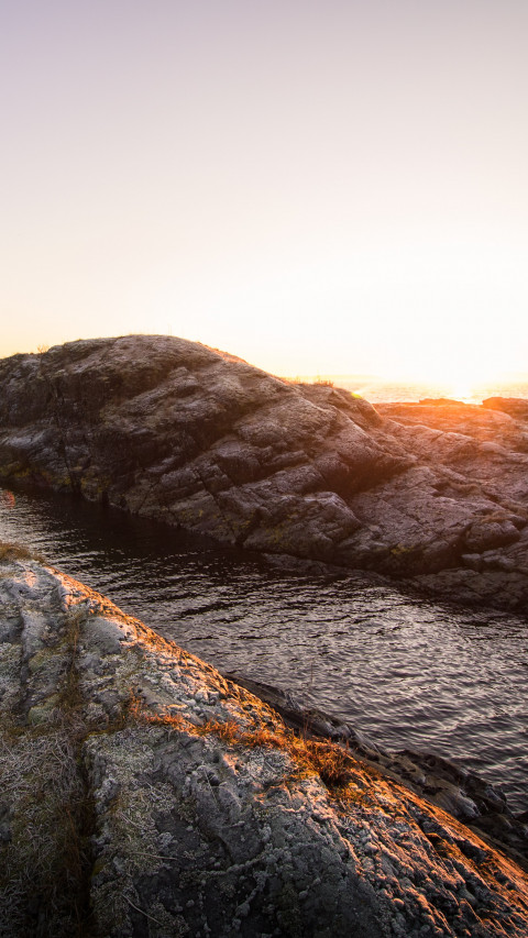 Rock Formation Near Body of Water