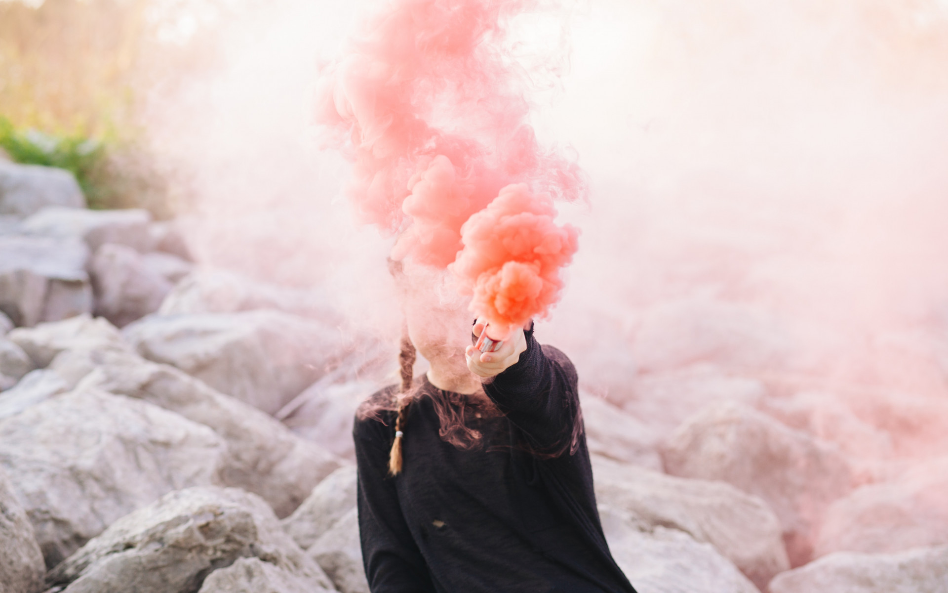 Woman Holding Color Smoke Grenade
