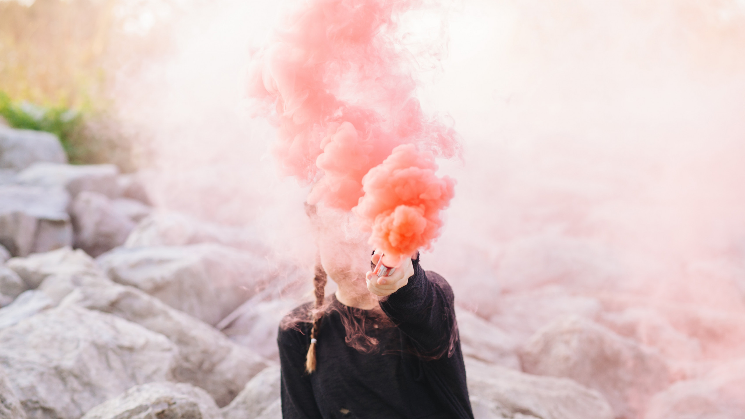 Woman Holding Color Smoke Grenade