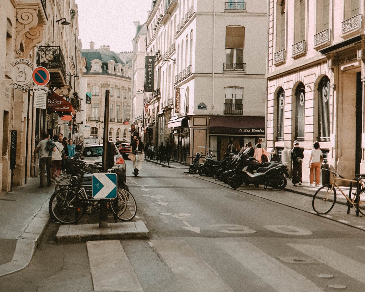 People Walking on Sidewalk Near Buildings