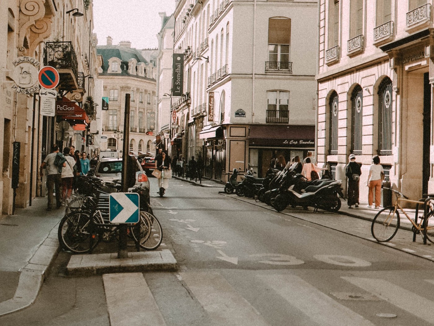 People Walking on Sidewalk Near Buildings