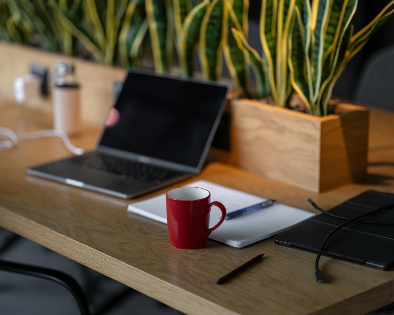 Mug, Notebook and Laptop on Table