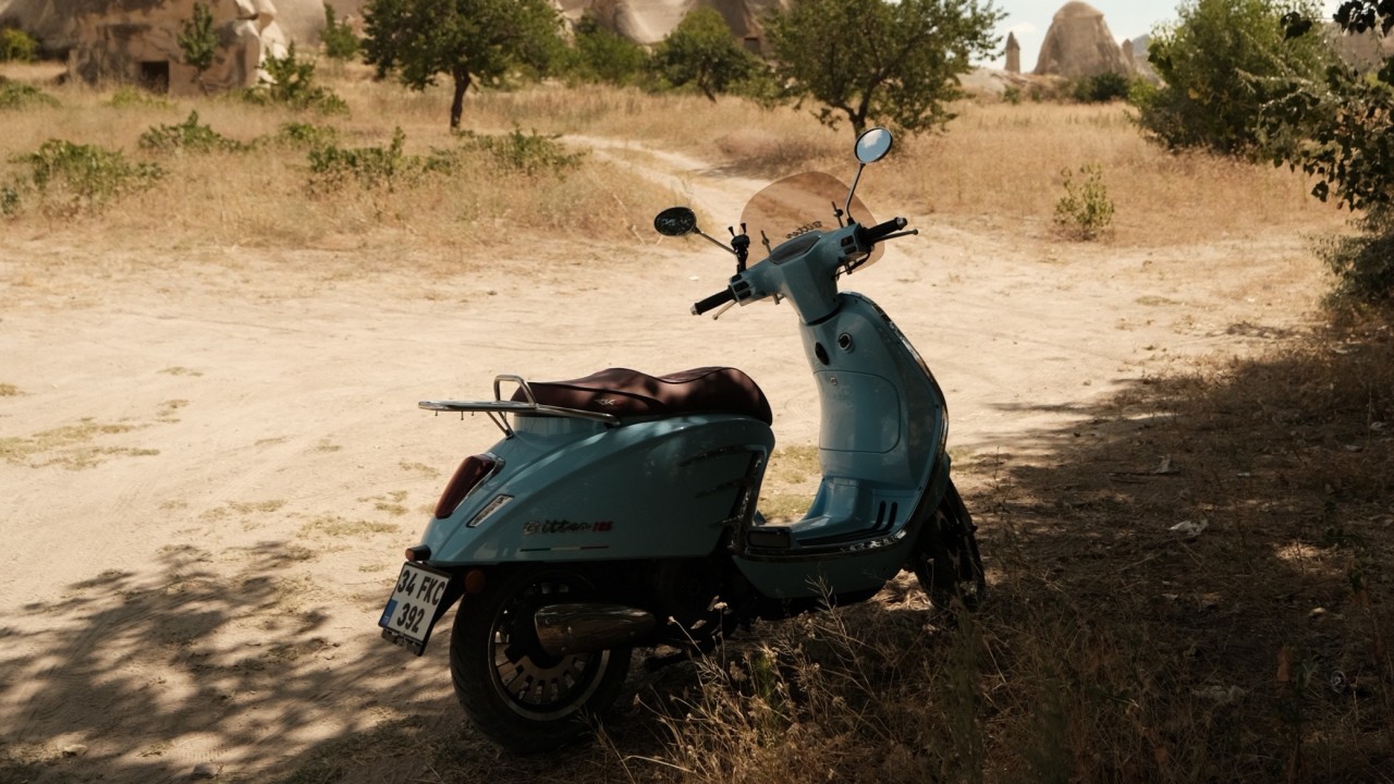 Motorcycle Parked on Brown Sand