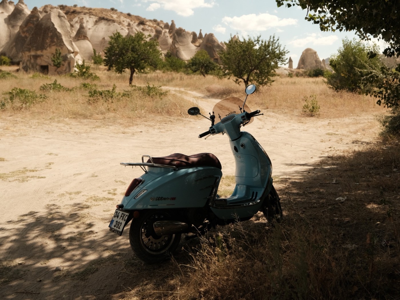 Motorcycle Parked on Brown Sand