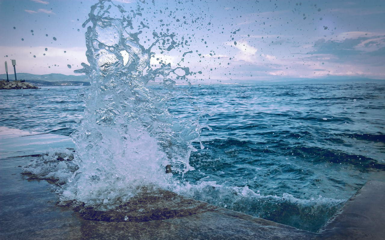 Water Smashing On Concrete Pavement