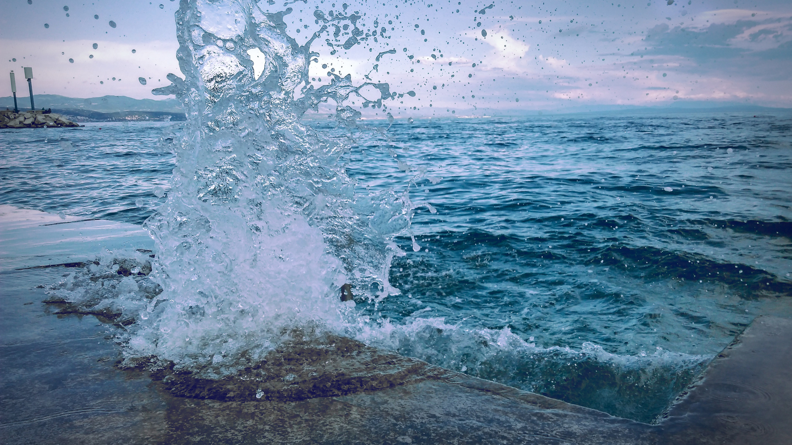 Water Smashing On Concrete Pavement