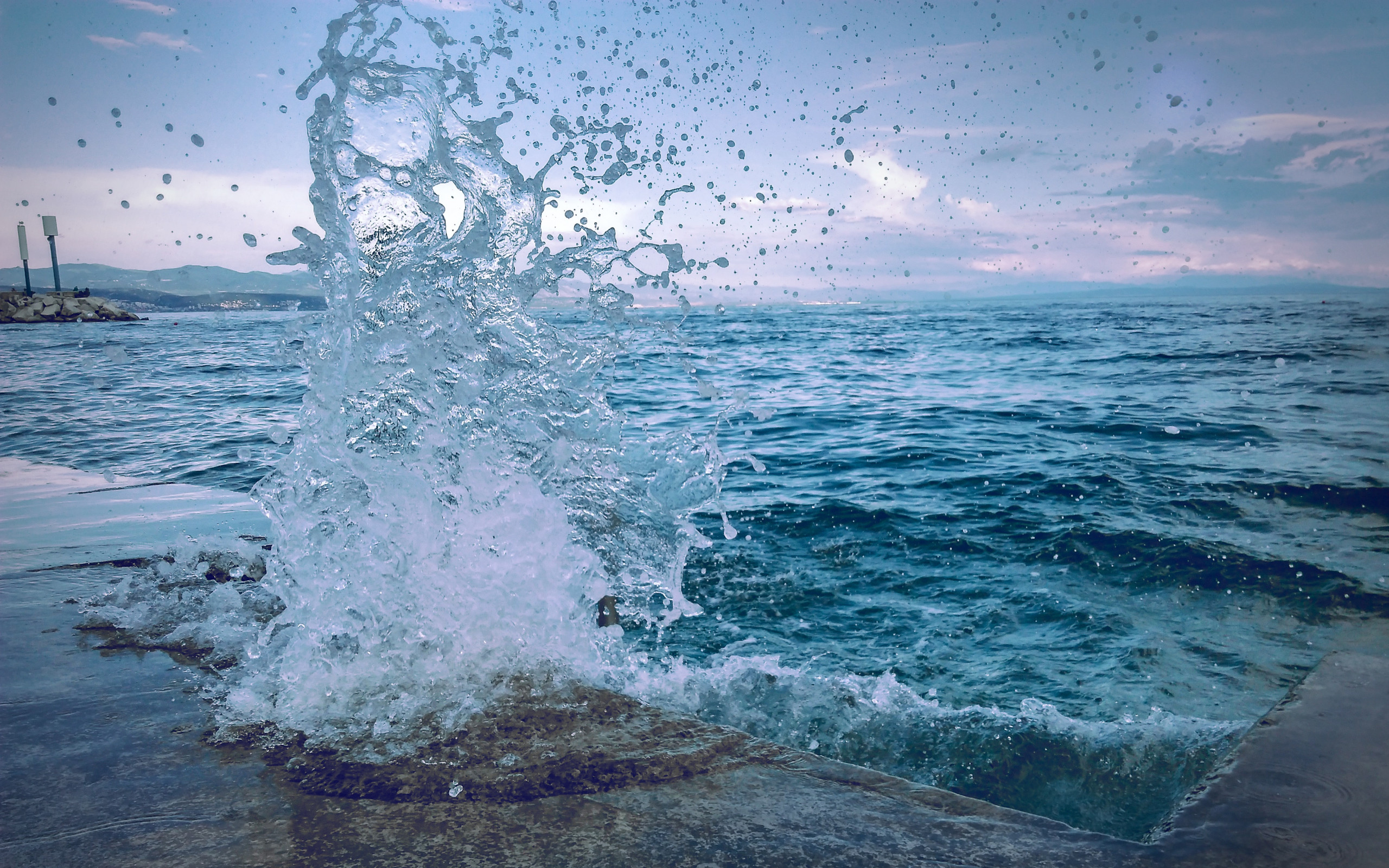 Water Smashing On Concrete Pavement