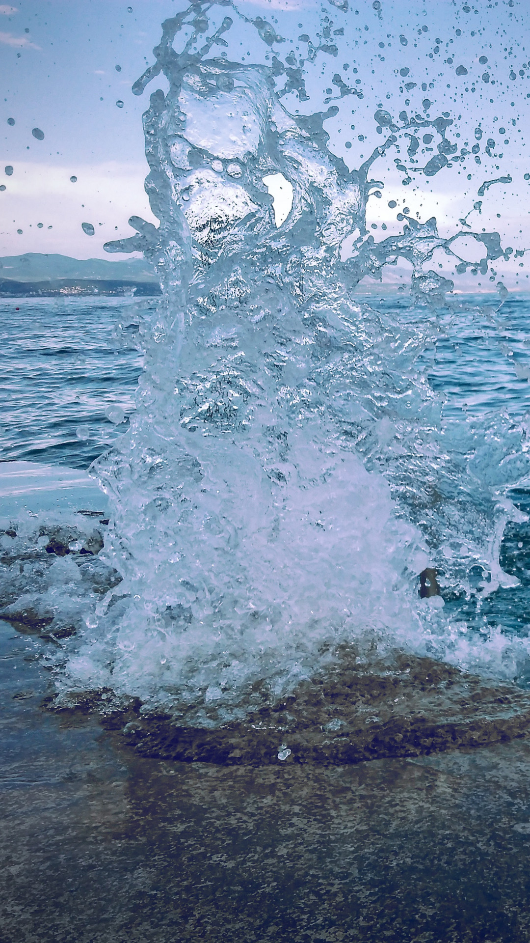 Water Smashing On Concrete Pavement