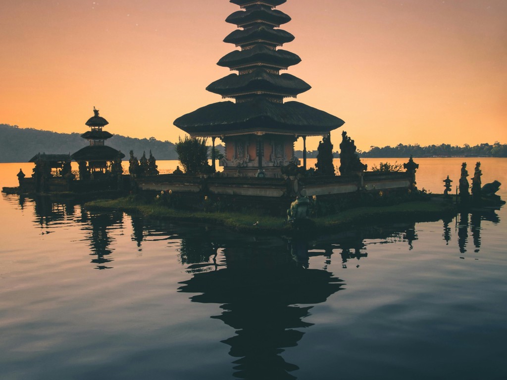 Brown Pagoda Near Body of Water