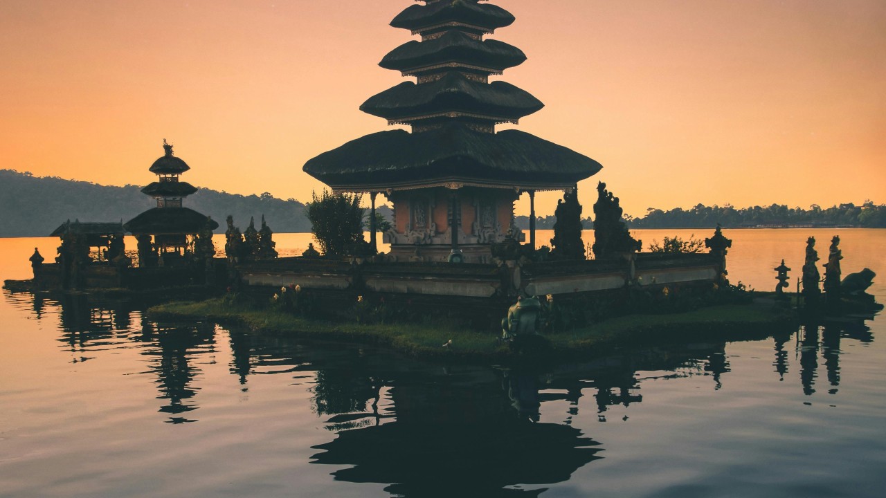 Brown Pagoda Near Body of Water