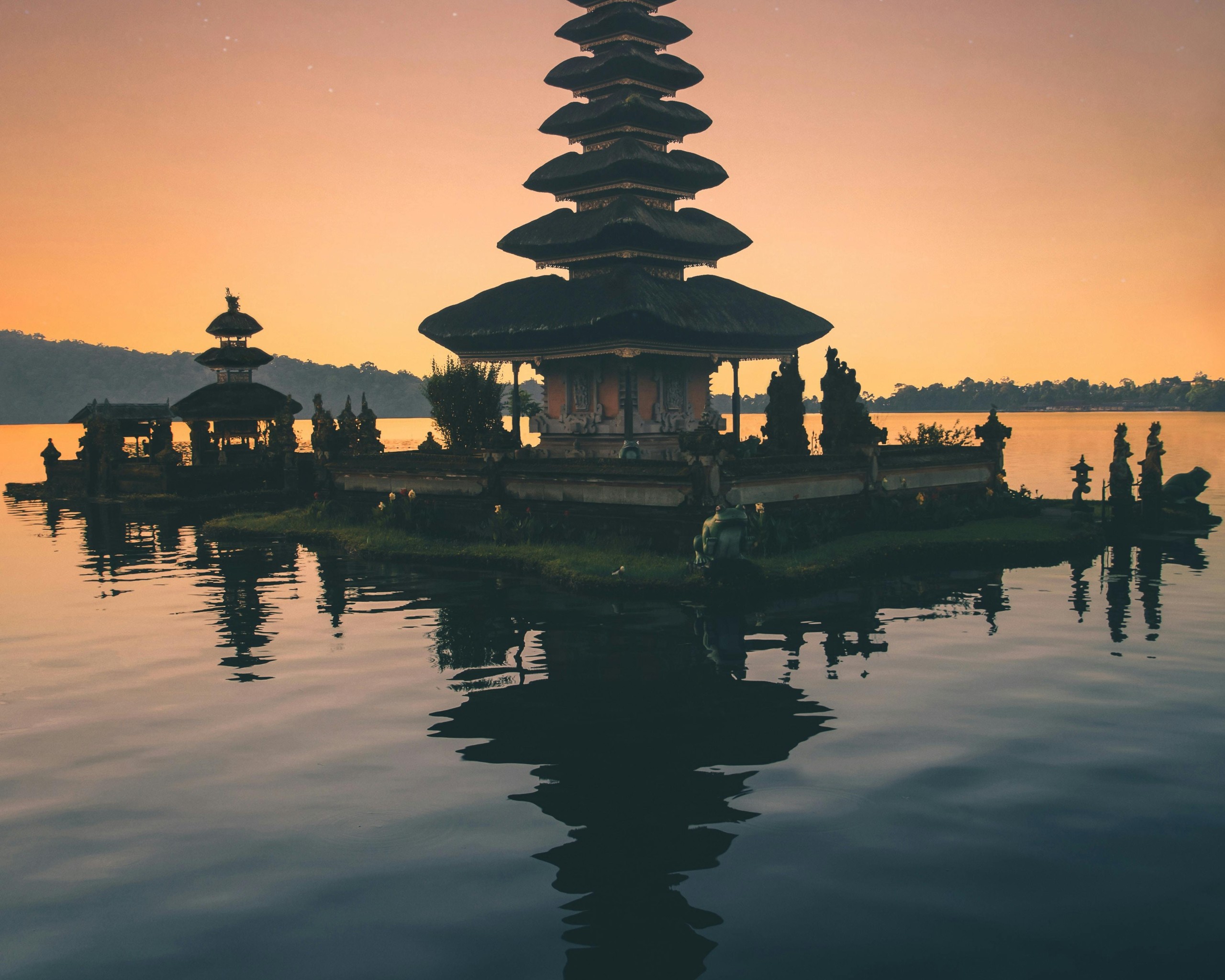 Brown Pagoda Near Body of Water