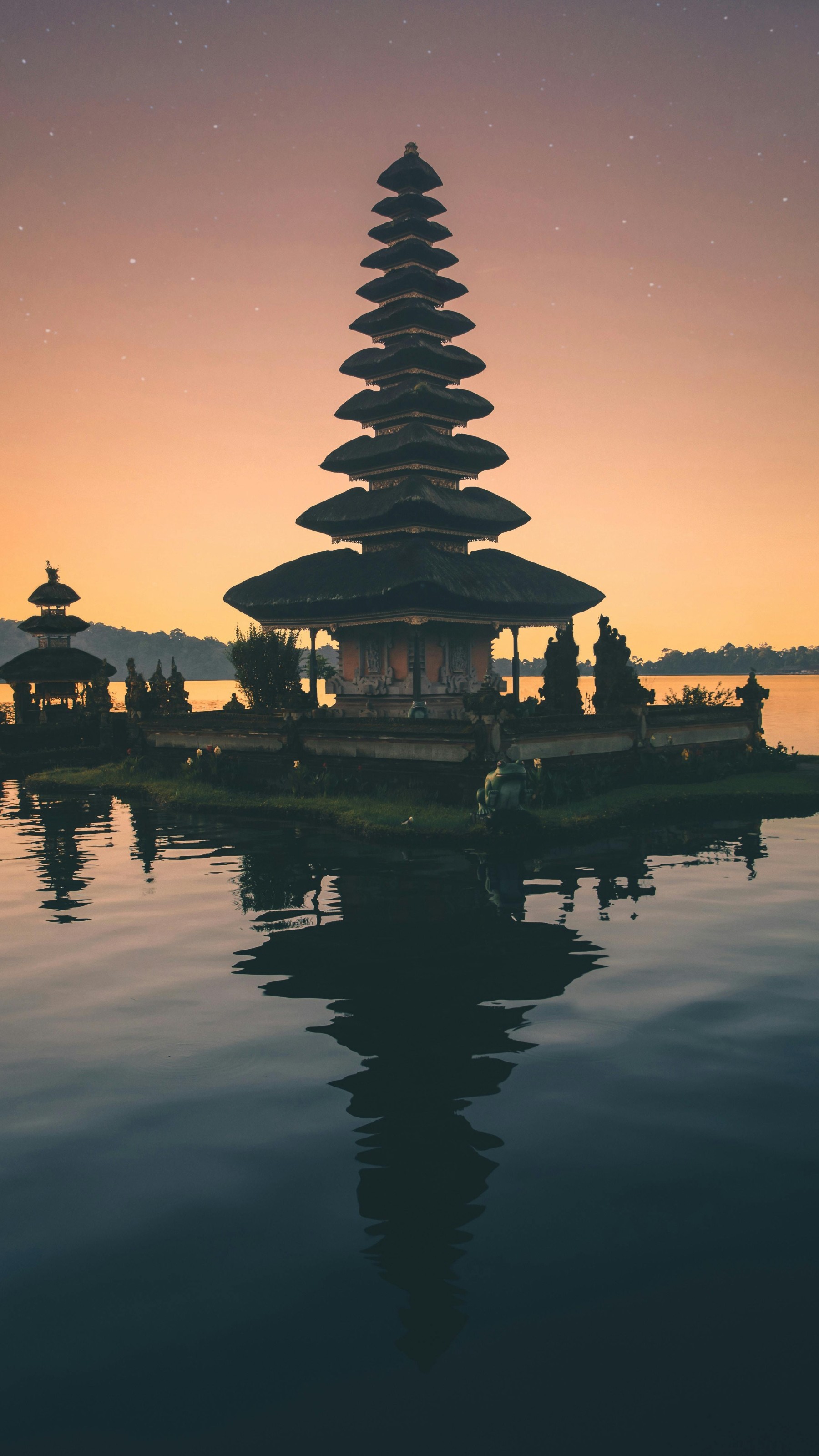 Brown Pagoda Near Body of Water
