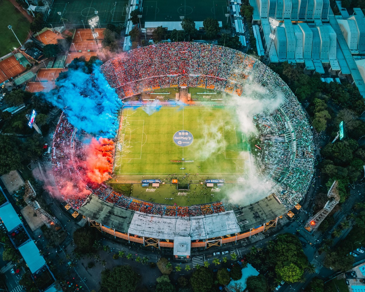 Stadium with Blue and Red Smoke
