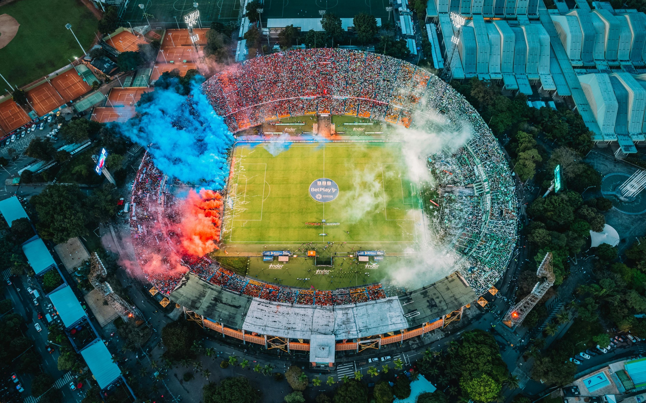 Stadium with Blue and Red Smoke
