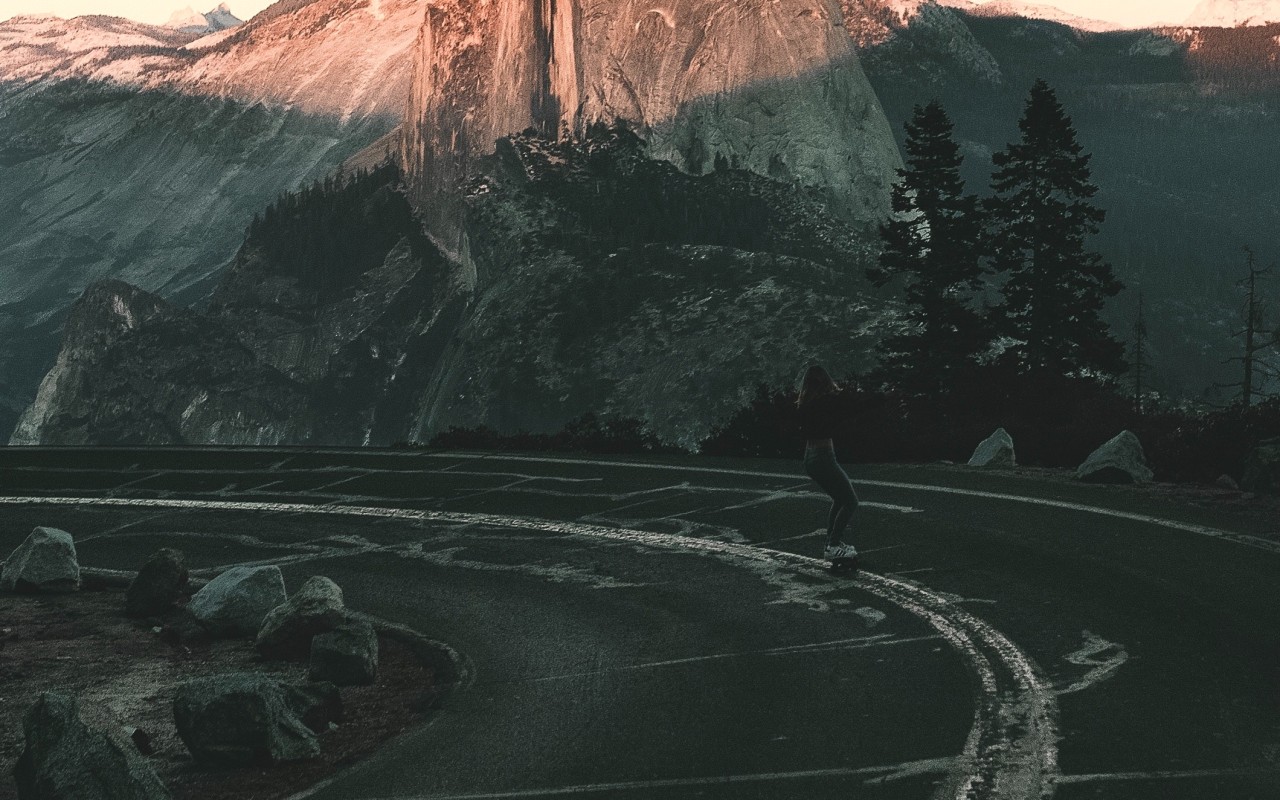 Girl skating on road