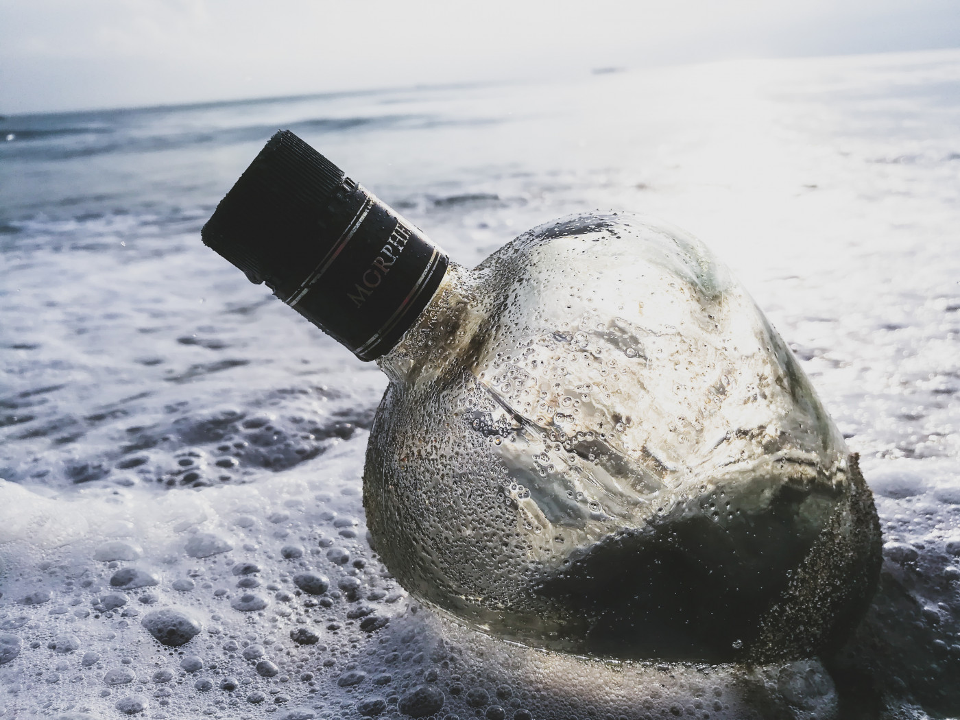 Glass Bottle in the Water