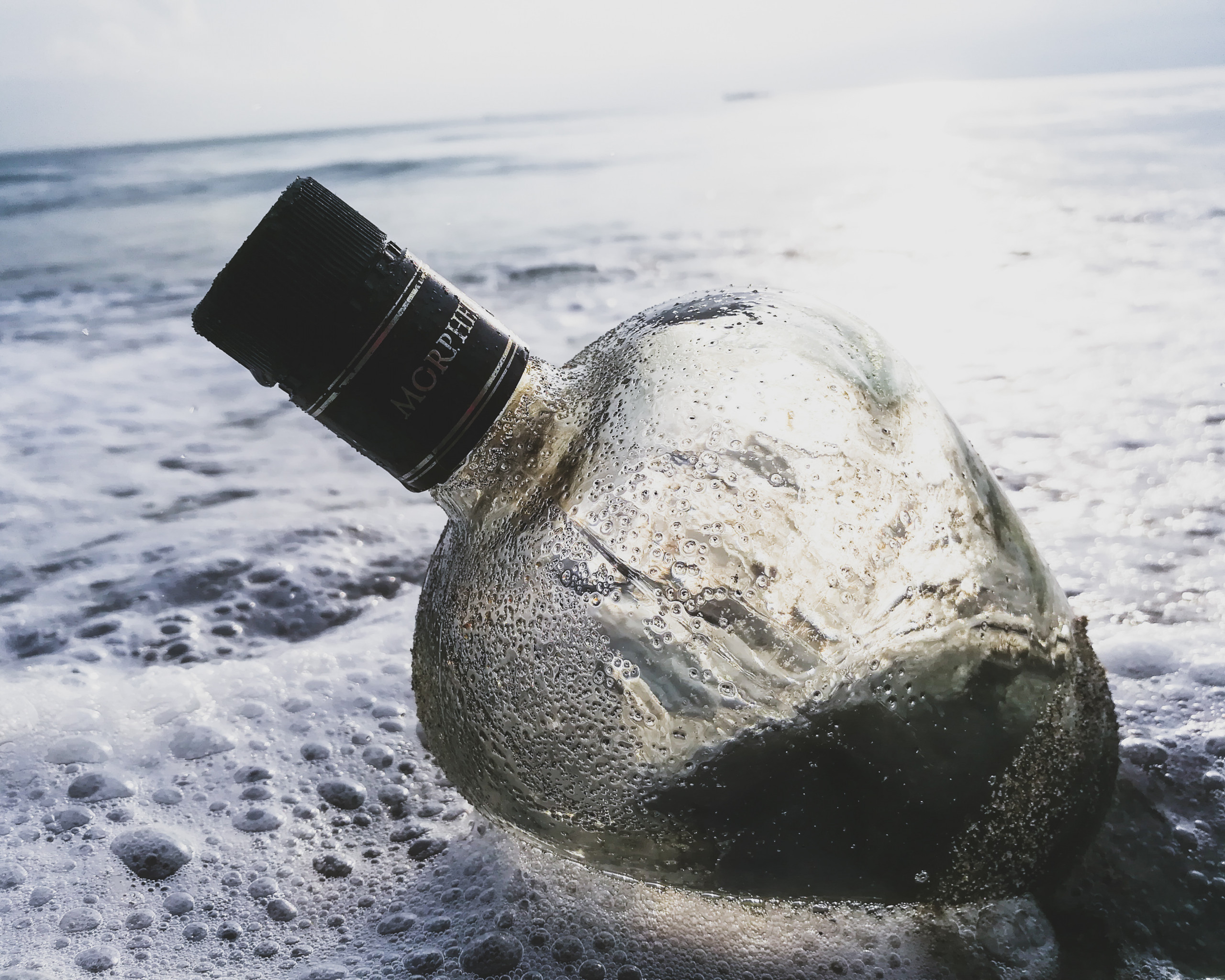 Glass Bottle in the Water