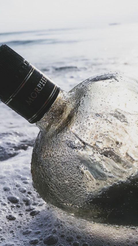 Glass Bottle in the Water