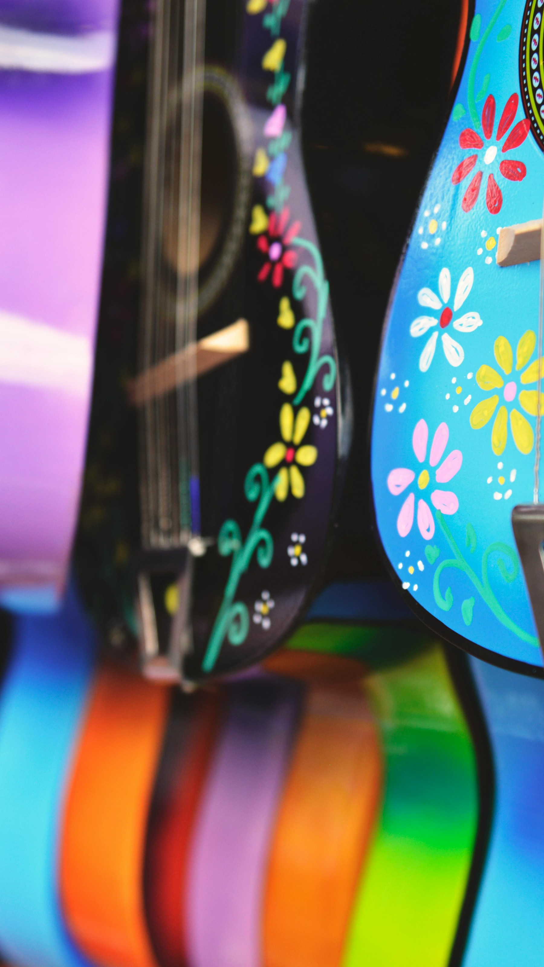 Blue, Purple and Green Acoustic Guitars
