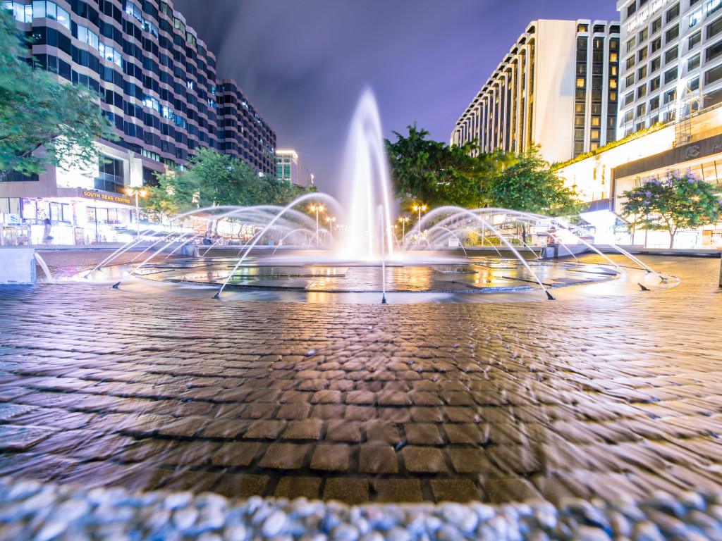 Fountain Surrounded by Trees and Buildings