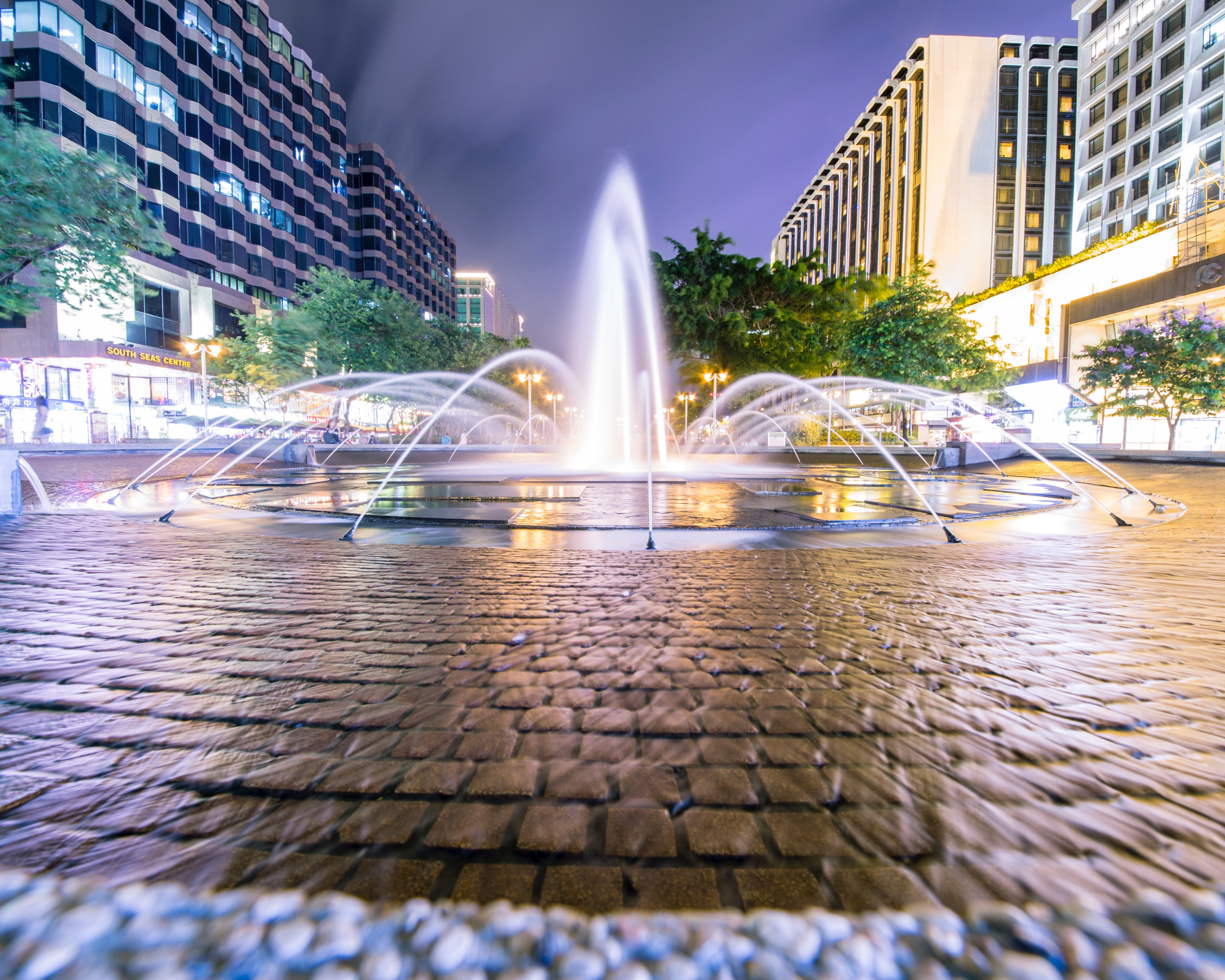 Fountain Surrounded by Trees and Buildings