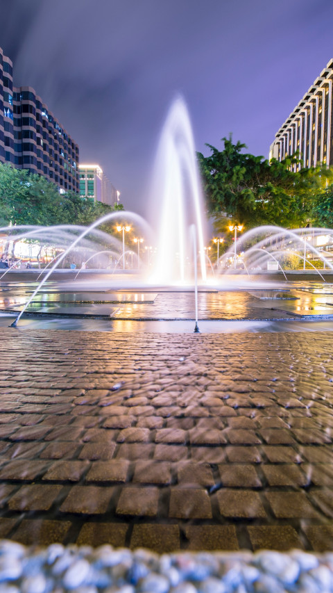 Fountain Surrounded by Trees and Buildings