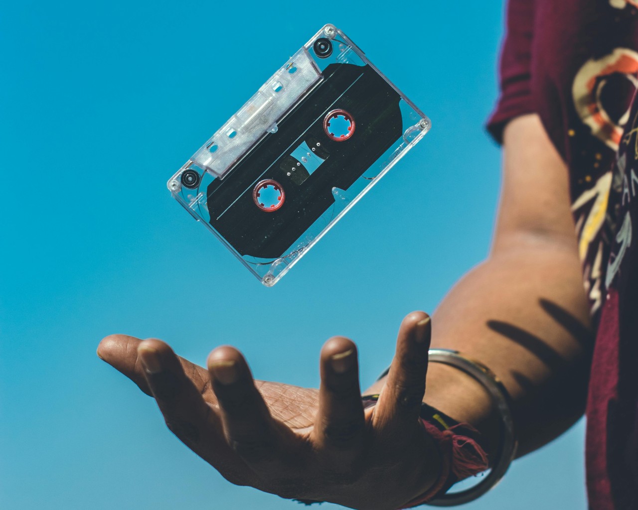 Person Doing Tricks on Cassette Tape