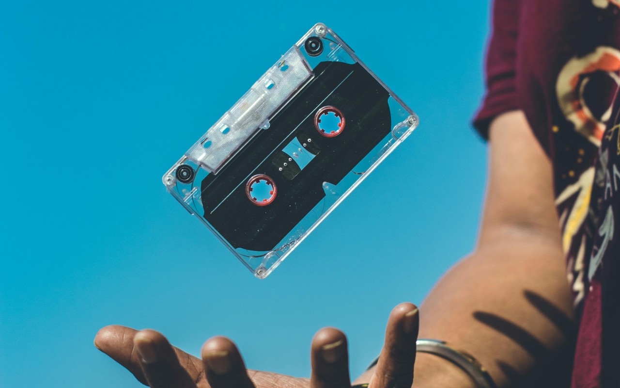 Person Doing Tricks on Cassette Tape
