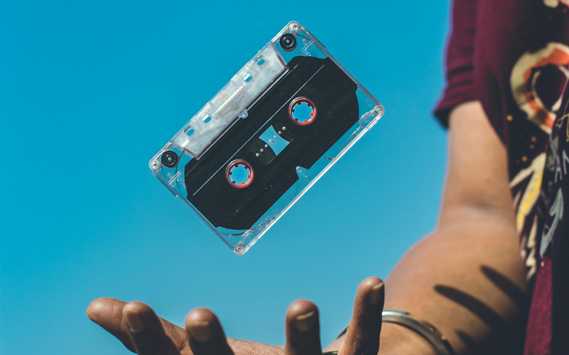 Person Doing Tricks on Cassette Tape